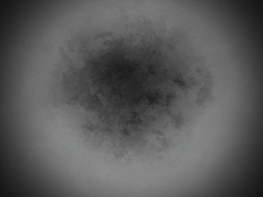 Dairesel bir nesnenin siyah beyaz fotoğrafı