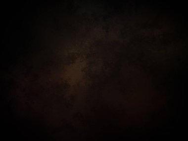 Ortasında ışık olan koyu bir arkaplan.