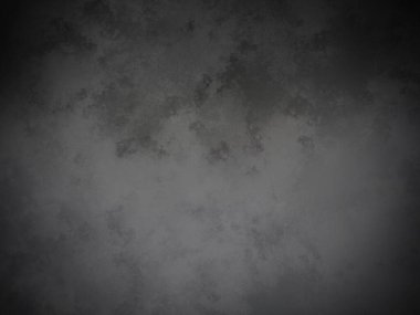 Bir duvarın siyah beyaz fotoğrafı.