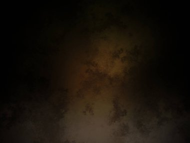 Karanlık bir arka plan, tepesinde bir ışık parlıyor.