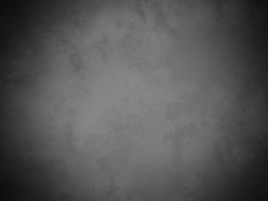 Bir duvarın siyah beyaz fotoğrafı.