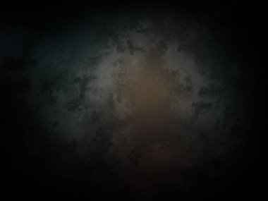 Ortasında ışık olan koyu bir arkaplan.