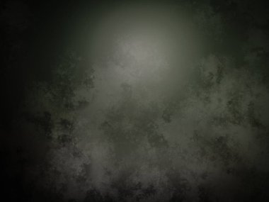 Ortasında ışık olan koyu yeşil bir arka plan.