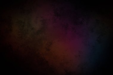 koyu bir arkaplan ve renkli bir ışık