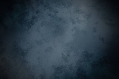 desenli yüzeyi olan koyu mavi bir arkaplan