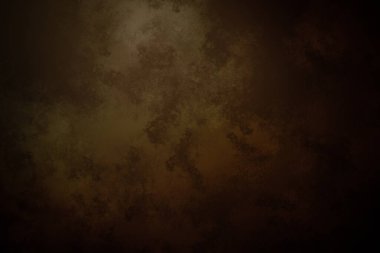 Koyu kahverengi bir arka plan ve içinden bir ışık geçiyor.