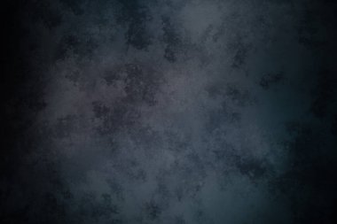 Koyu mavi bir arkaplan ve kaba bir doku.