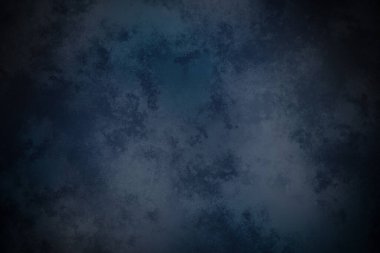 Koyu mavi bir arkaplan ve kaba bir doku.