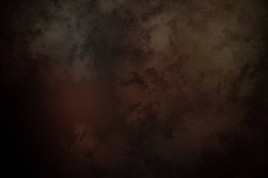 Ortasında kırmızı ışık olan koyu bir arkaplan.