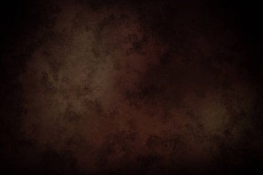 Koyu kahverengi arka plan ve kırmızı nokta.