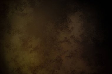 Koyu kahverengi arka plan ve küçük beyaz bir saat.