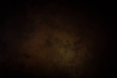 Siyah ve kahverengi bir arka plan ve koyu bir çember.