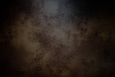 Koyu kahverengi bir arka plan ve soluk bir doku.