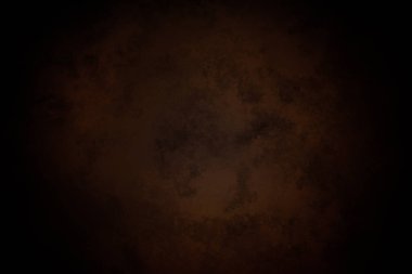 Dairesel desenli koyu kahverengi bir arkaplan.