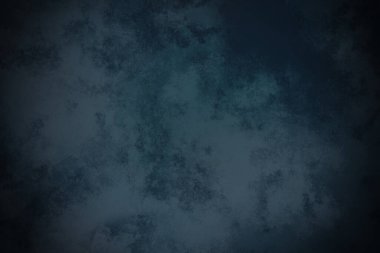 Koyu mavi bir arkaplan ve kaba bir doku.