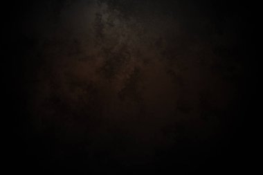 koyu kahverengi ve beyaz desenli siyah bir arkaplan.