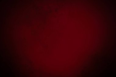 Siyah arkaplanı ve kırmızı ışığı olan kırmızı bir arkaplan