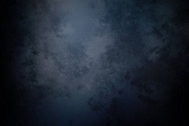 desenli yüzeyi olan koyu mavi bir arkaplan