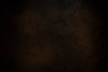 koyu kahverengi ve beyaz desenli siyah bir arkaplan.