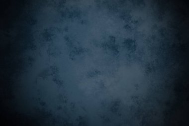 Koyu mavi bir arkaplan ve kaba bir doku.