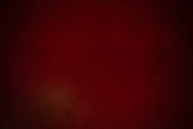 Üzerinde saat olan kırmızı bir duvar.