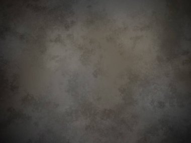 Koyu gri bir arkaplan ve pürüzlü bir doku