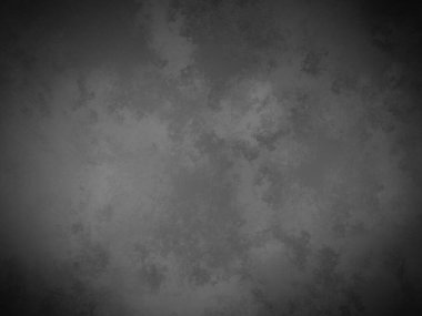 Bir duvarın siyah beyaz fotoğrafı.