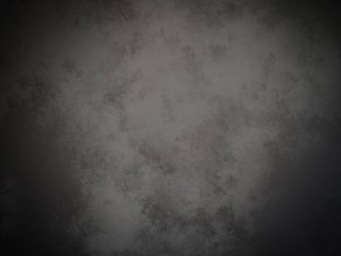 Bir duvarın siyah beyaz fotoğrafı.