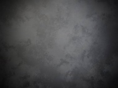 Bir duvarın siyah beyaz fotoğrafı.