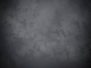 Koyu gri bir arkaplan ve pürüzlü bir doku