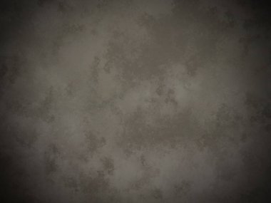 Koyu gri bir duvar ve beyaz bir nokta.