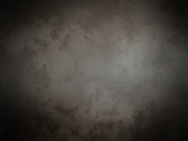 Ortasında beyaz nokta olan siyah bir duvar.