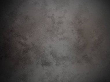 Bir duvarın siyah beyaz fotoğrafı.