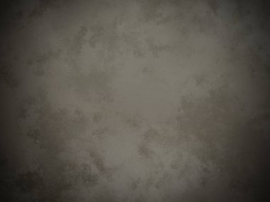 Koyu gri bir duvar ve beyaz bir nokta.