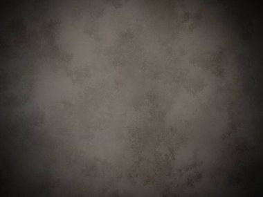 Koyu gri bir duvar ve beyaz bir nokta.