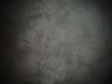 Bir duvarın siyah beyaz fotoğrafı.