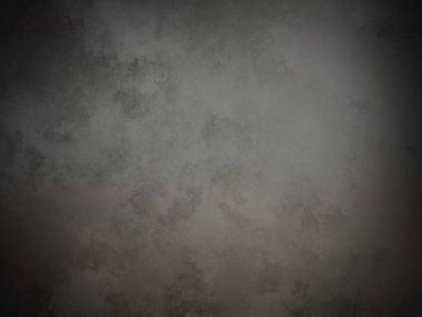 Koyu gri bir duvar ve beyaz bir nokta.