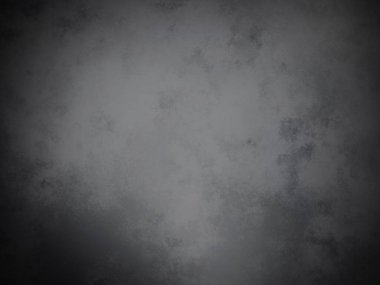 Bir duvarın siyah beyaz fotoğrafı.