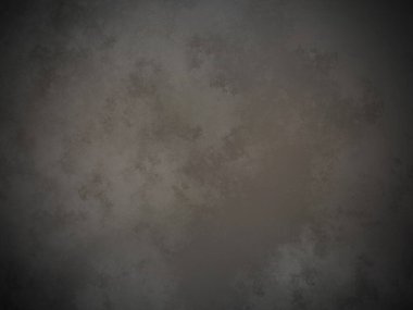 Koyu gri bir arkaplan ve pürüzlü bir doku