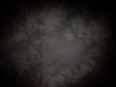 Ortada siyah bir nokta olan siyah bir arkaplan.