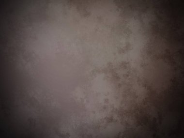 Siyah arka planı olan kahverengi bir duvar.