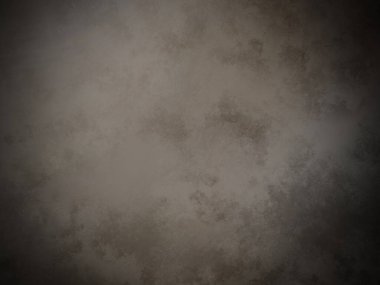 Karanlık ve kirli bir duvarın içinden bir ışık geliyor.