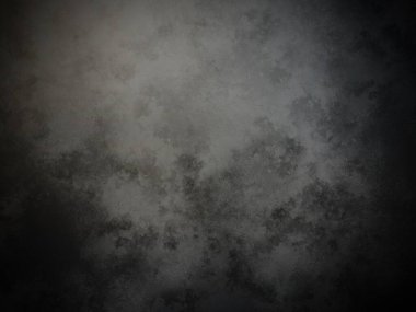 Bir duvarın siyah beyaz fotoğrafı.