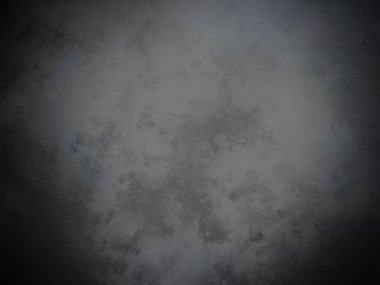 Bir duvarın siyah beyaz fotoğrafı.