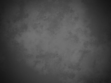 Bir duvarın siyah beyaz fotoğrafı.