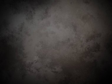 desenli yüzeyi olan koyu bir arkaplan