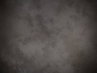 Koyu gri bir duvar ve beyaz bir nokta.