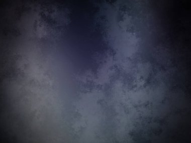 Koyu mavi gökyüzü ve birkaç bulut.