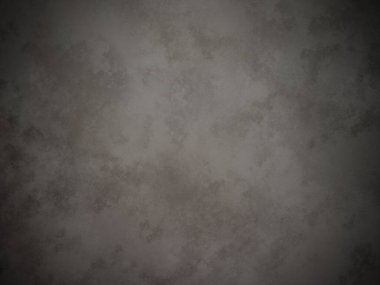 Beyaz kenarlı koyu gri bir duvar.