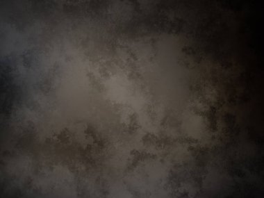 desenli yüzeyi olan koyu bir arkaplan